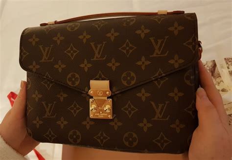 como saber cuando una cartera louis vuitton es original|authentic Louis Vuitton purses.